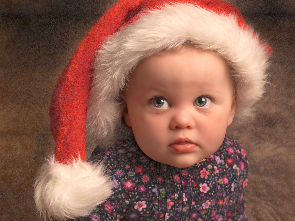 Baby wearing a santa hat