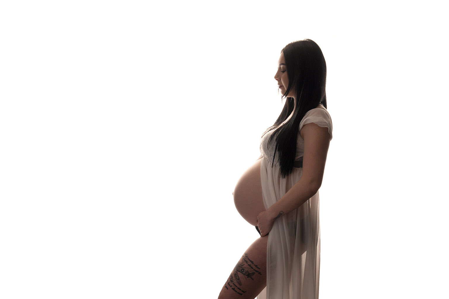Cherished moments of pregnancy captured in a professional studio near Basingstoke