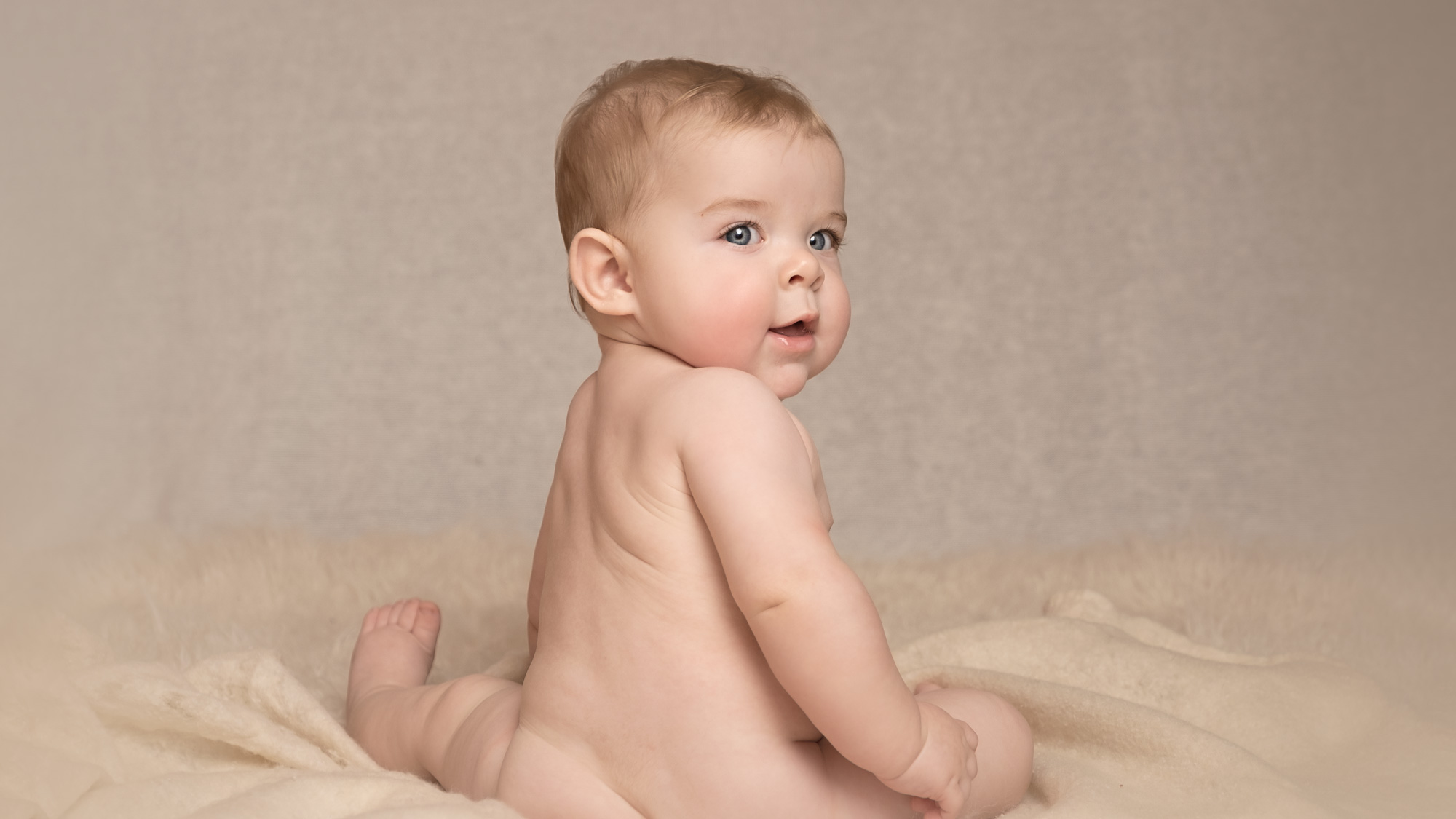 Baby sitter session in Andover studio—neutral, classic portrait at 7 months.