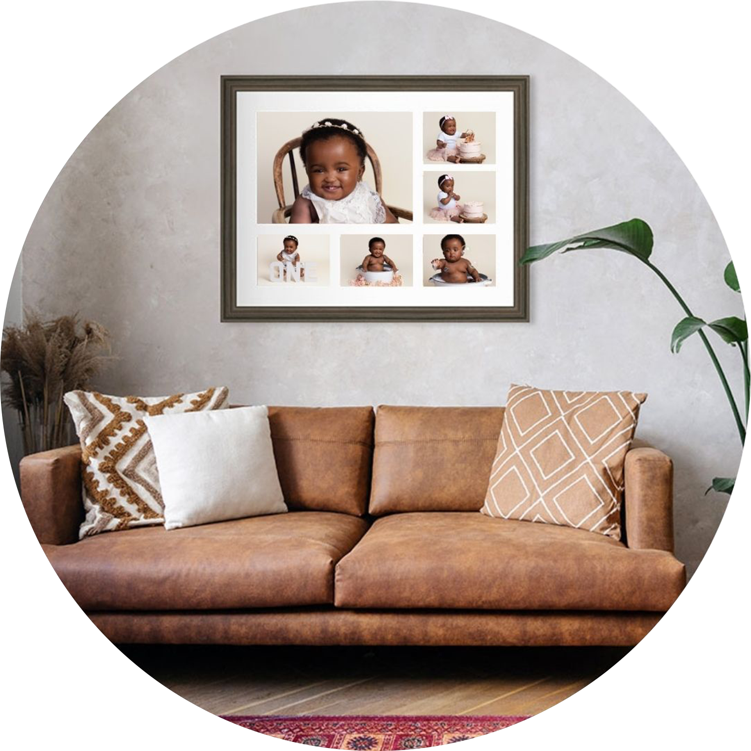 Framed multi-image cake smash collage featuring a baby’s first birthday portraits, professionally displayed as wall art above a sofa in a neutral family living room, photographed by a Hampshire baby photographer.