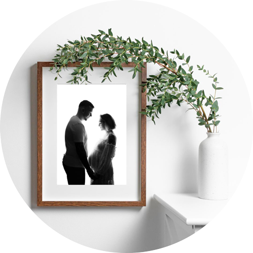 Framed maternity photograph of an expectant couple by a Hampshire maternity photographer, displayed as professional wall art.