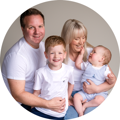 Family of four photographed together at a family photography studio near Andover, Hampshire