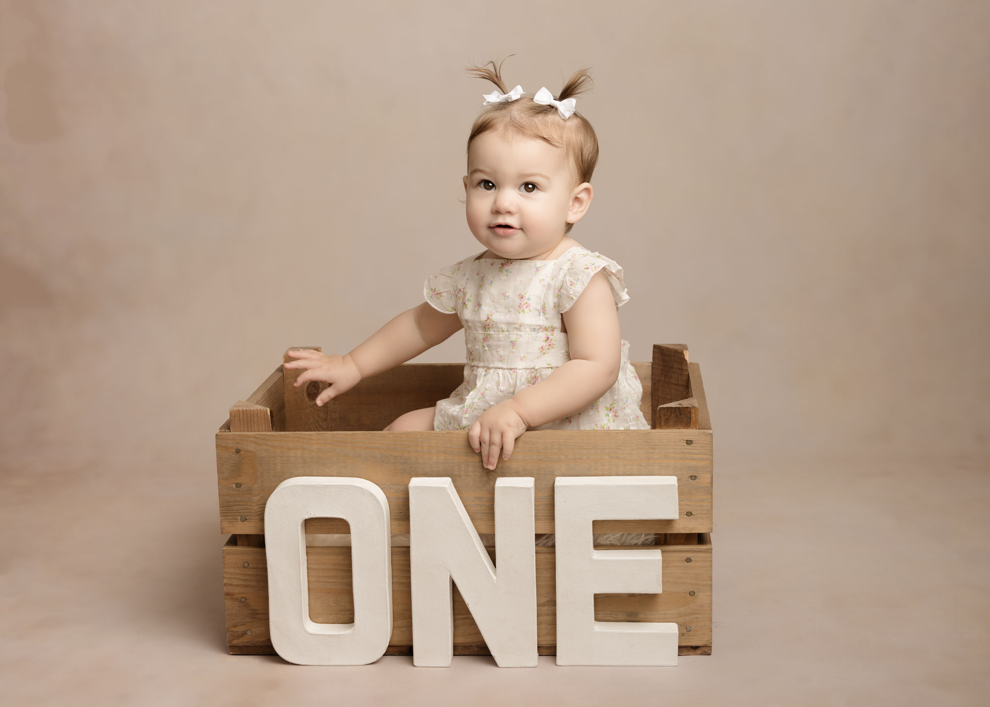 fine art portrait of child on first birthday at a Hampshire studio.