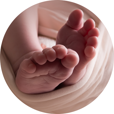 A close up of a newborn baby's feet.
